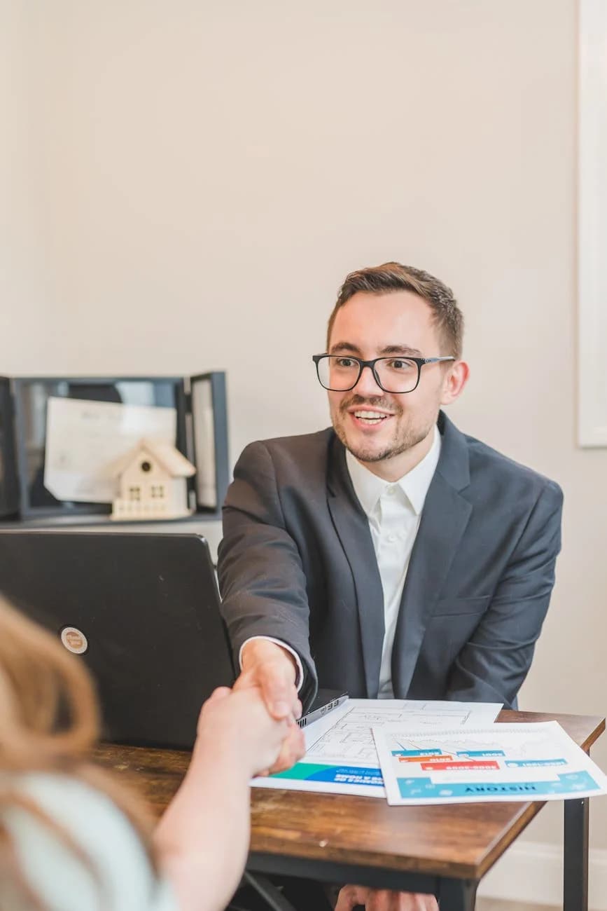 Business handshake representing customer-first mindset