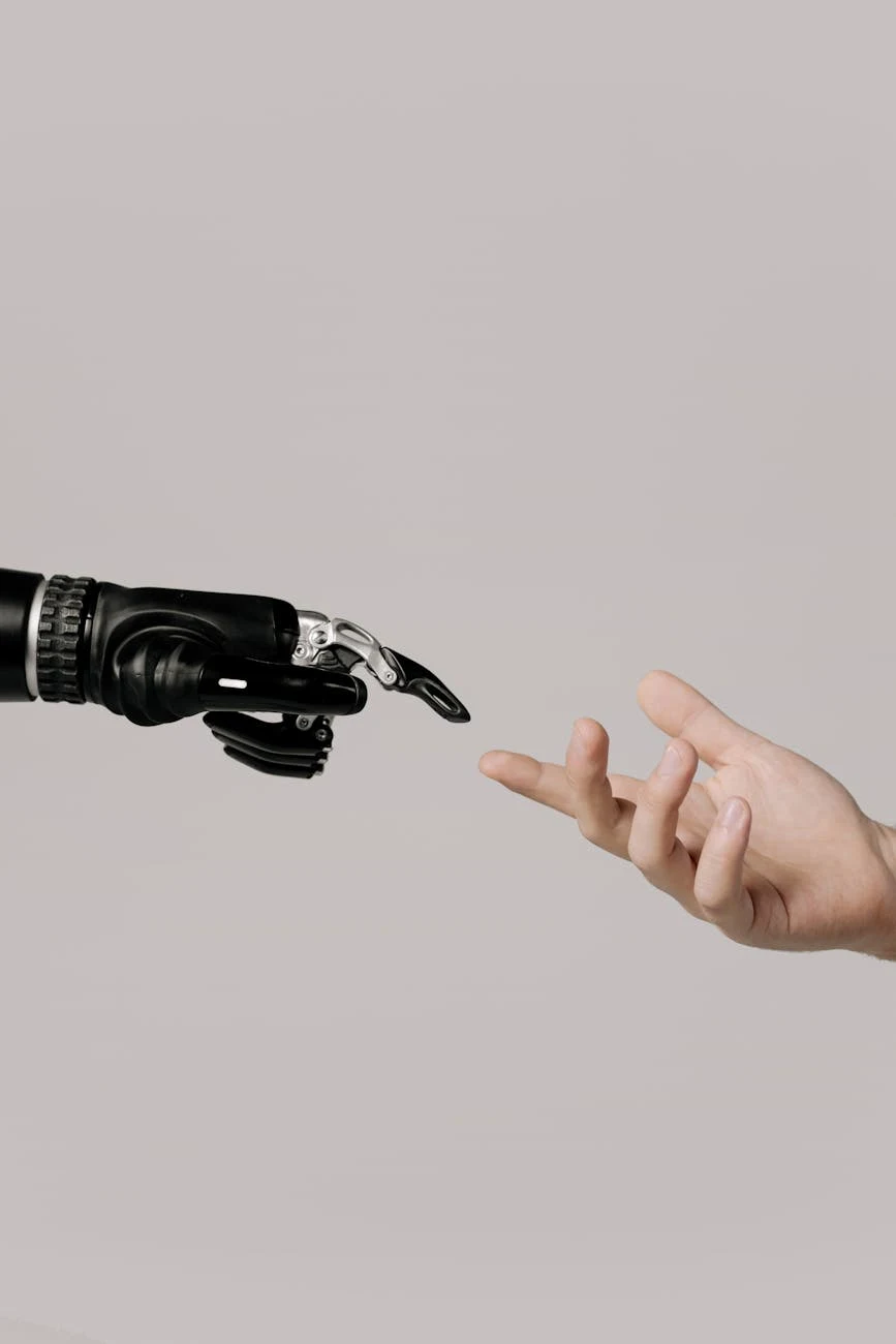 Robot and human hand representing technological innovation